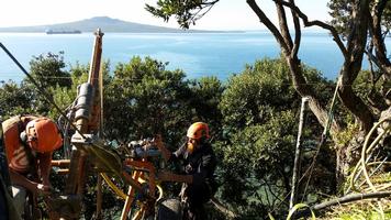 Drilling Of Anchors Along Top Of Cliff